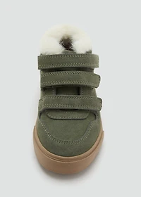 Leather and fur-effect trainers