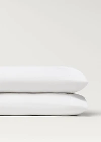 Two 500-thread count cotton percale pillowcases with rounded piping detail 50x75 cm