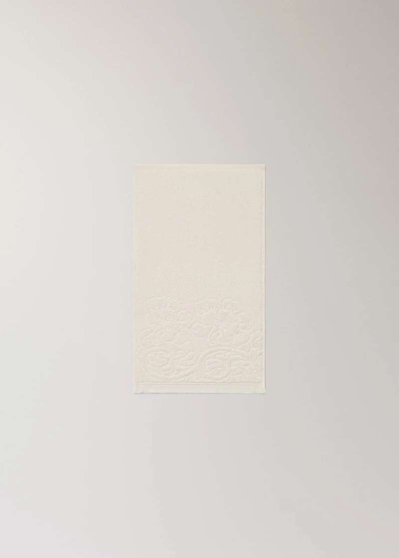 Hand towel with floral trim