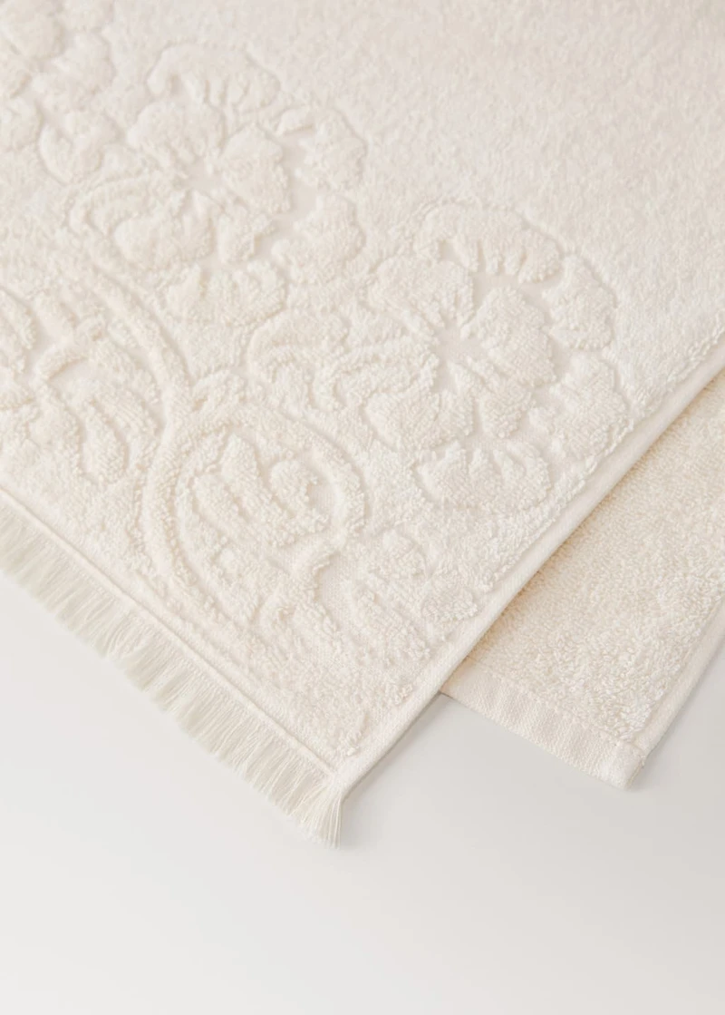 Washbasin towel with floral trim