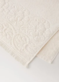 Washbasin towel with floral trim