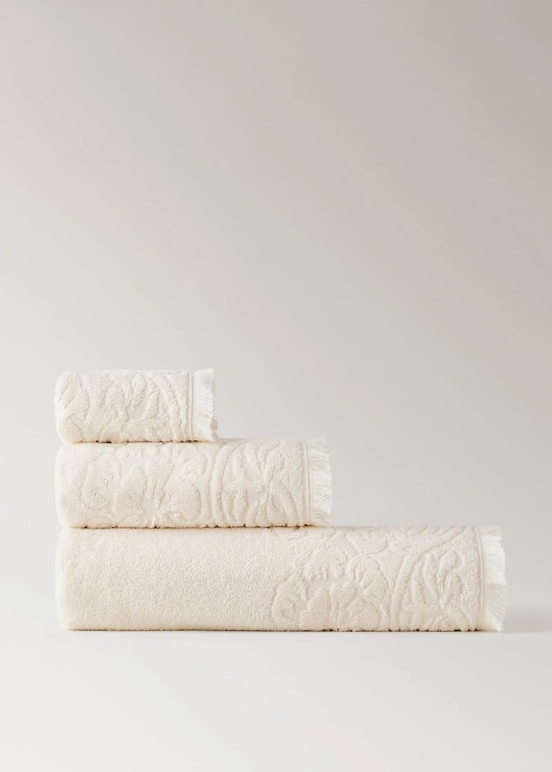 Bath towel with floral trim