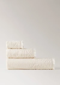 Bath towel with floral trim