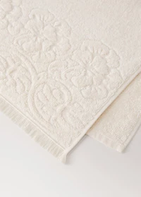 Bath towel with floral trim