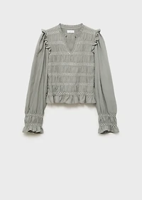 Ruffled blouse with embroidered details