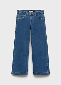 Low-waist studded jeans