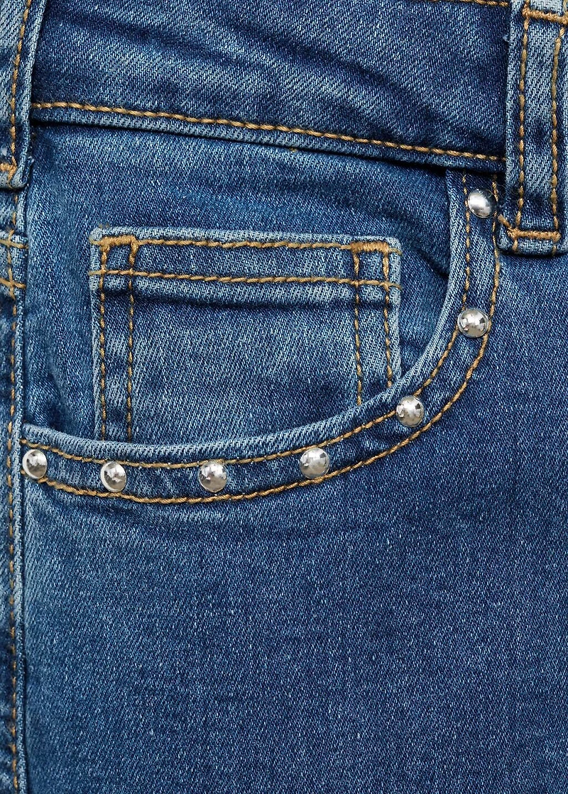 Low-waist studded jeans