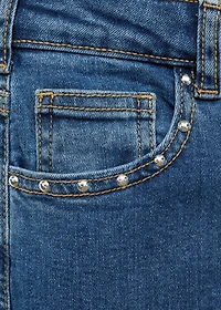 Low-waist studded jeans