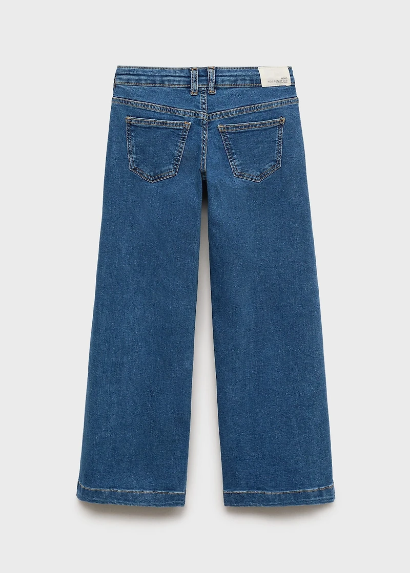 Low-waist studded jeans