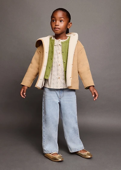 Reversible shearling coat