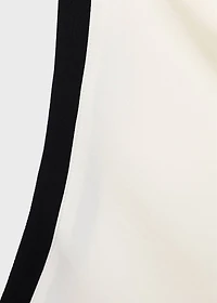 Blouse with draped collar and contrasting trim