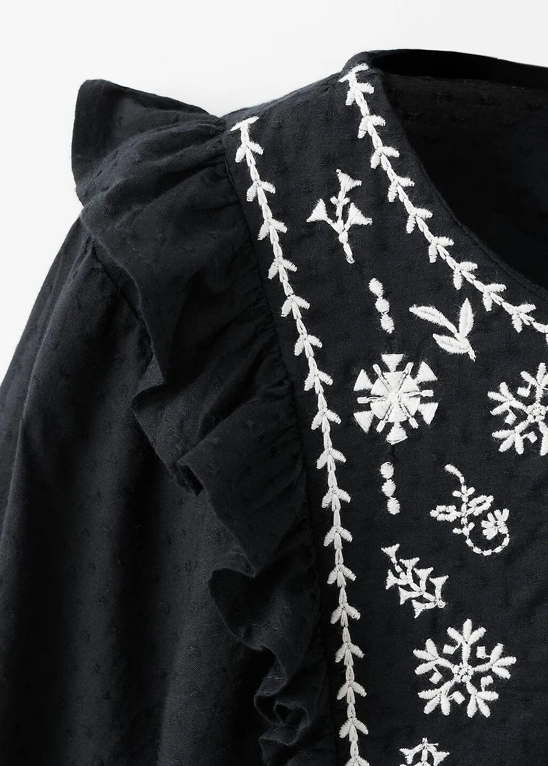 Ruffled embroidered blouse