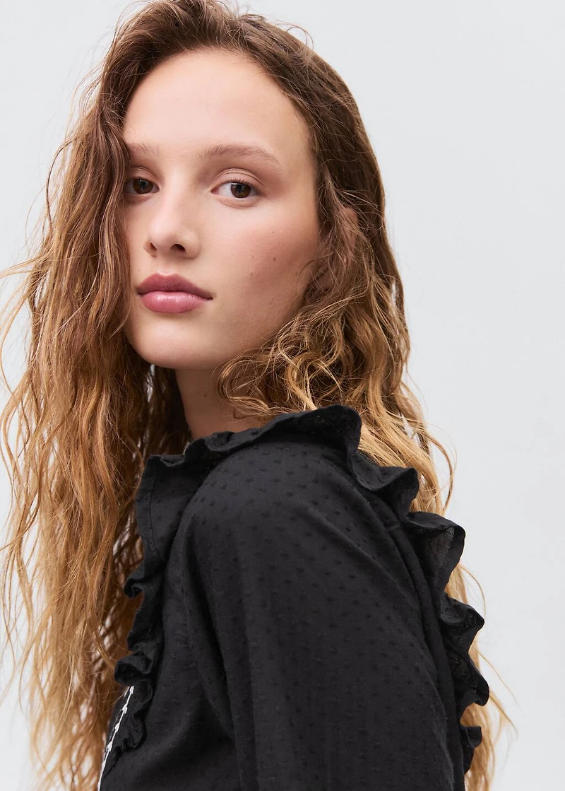 Ruffled embroidered blouse