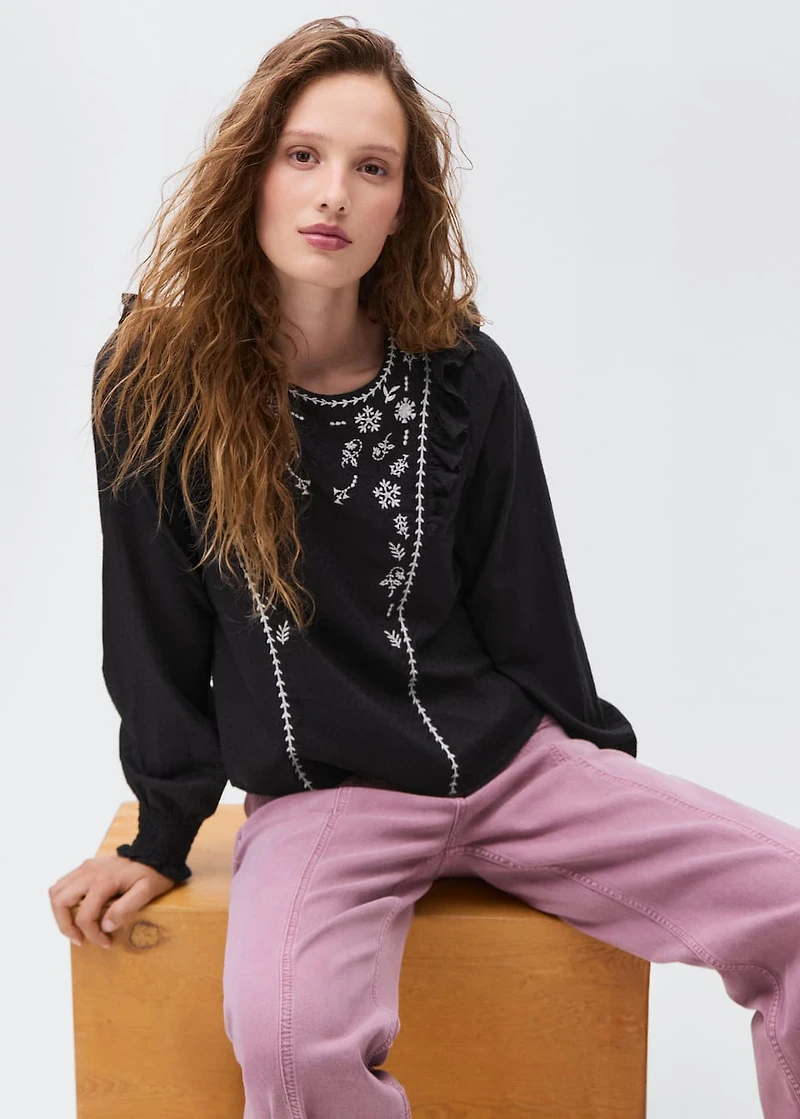 Ruffled embroidered blouse