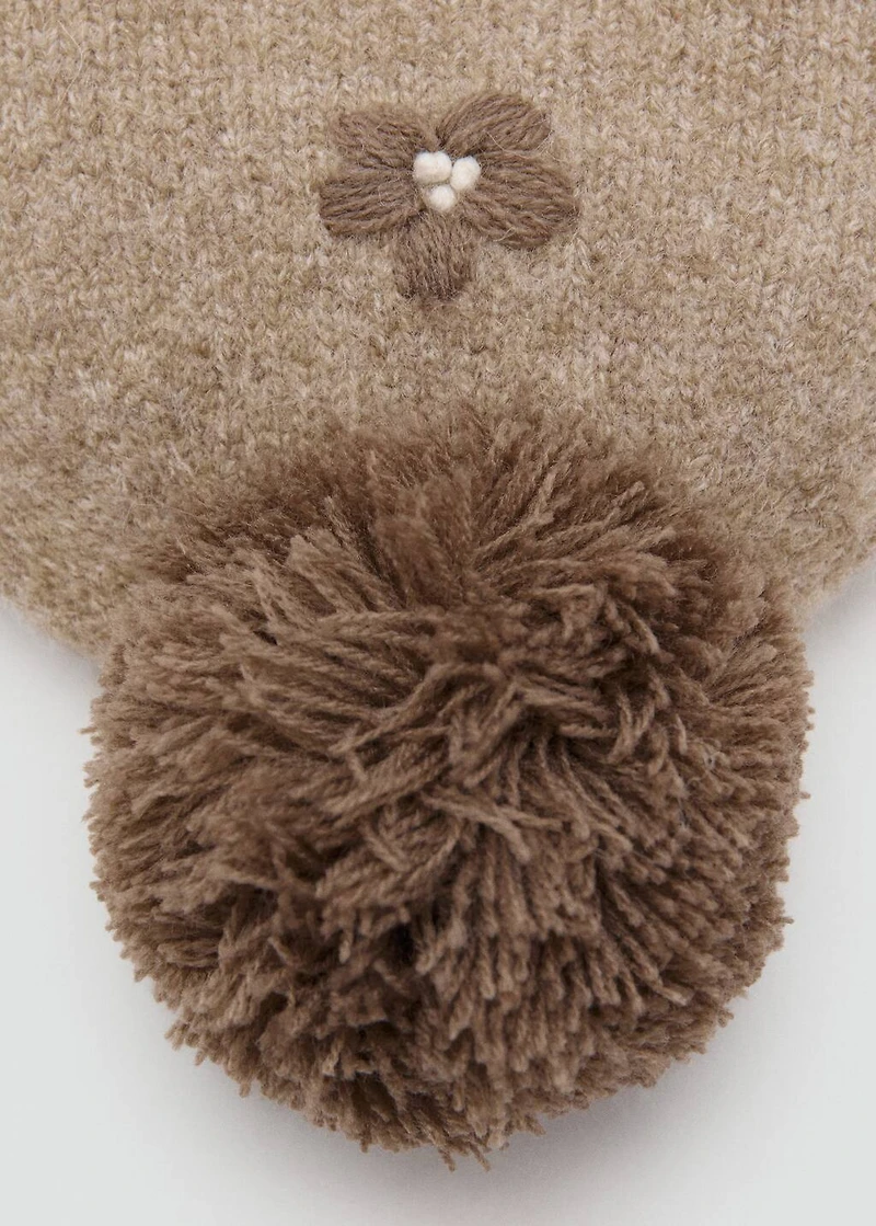 Floral pom-pom hat