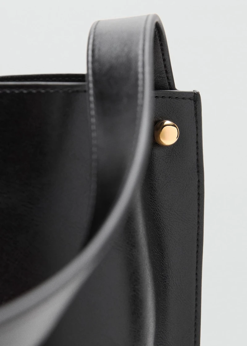Bucket bag with metal details