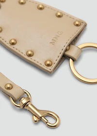 Leather-effect keychain with studs