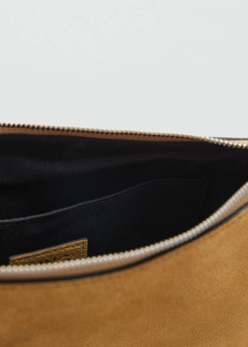 Suede bag with fringes and stud details