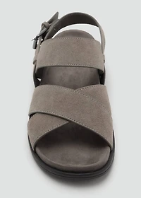 Crossed leather sandals with buckle