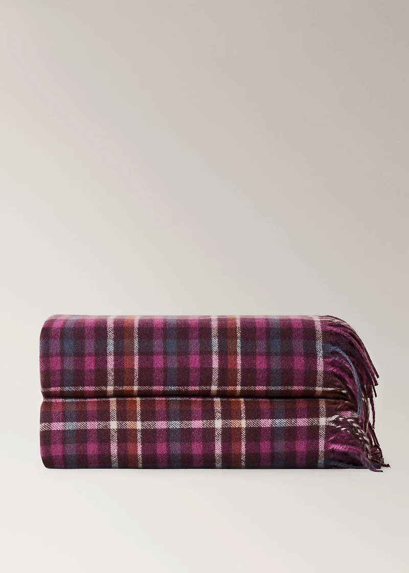 Soft fringed check blanket