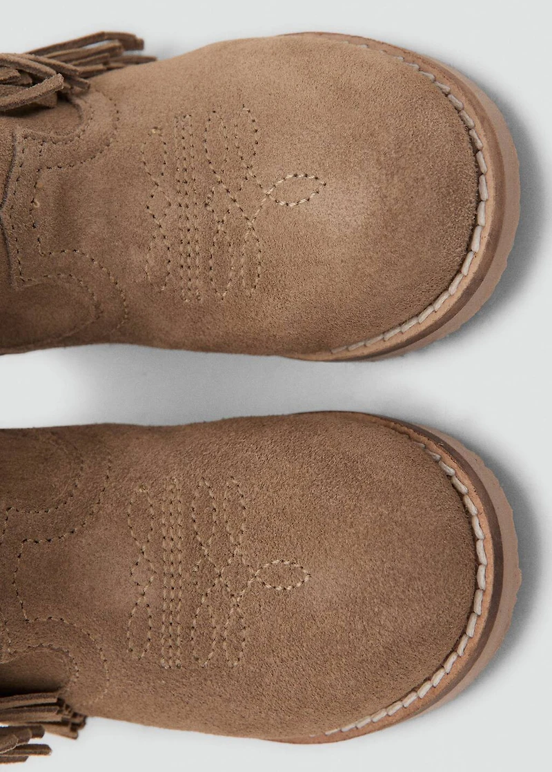 Fringed leather boots