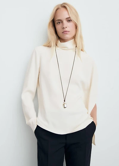 High-neck blouse with asymmetric sleeves