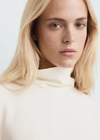 High-neck blouse with asymmetric sleeves