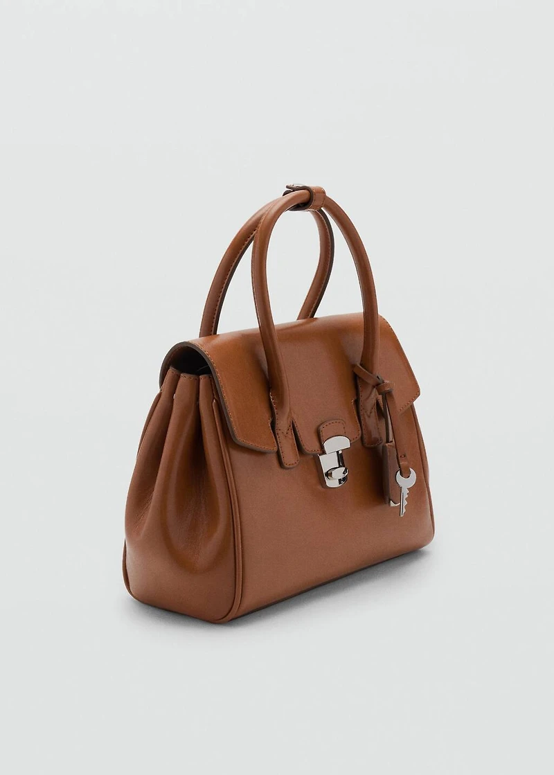 Small city handbag with flap