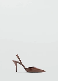 Pointed shoes with patent leather effect