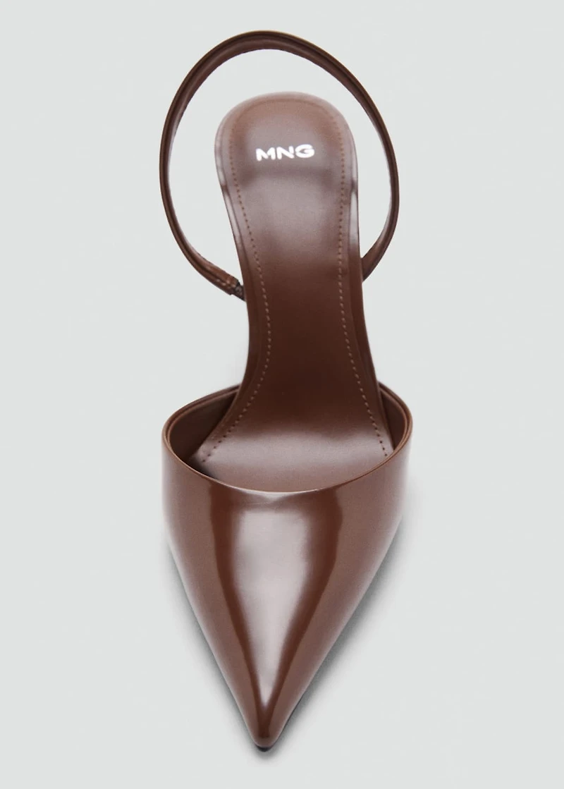 Pointed shoes with patent leather effect