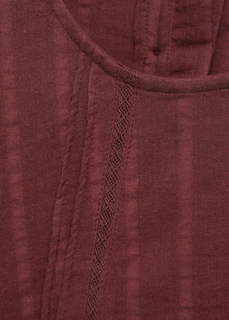 Blouse with pleat detail