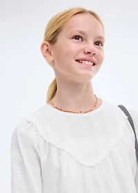 Blouse with lace trim details