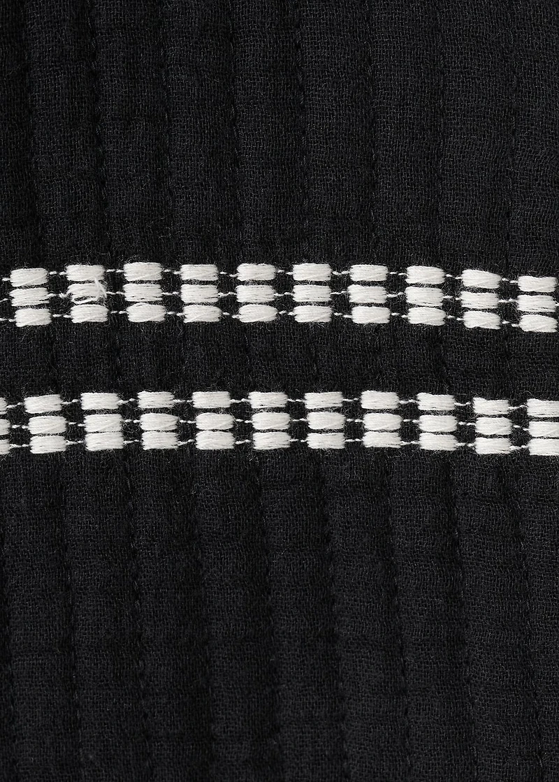 Embroidered vest with belt