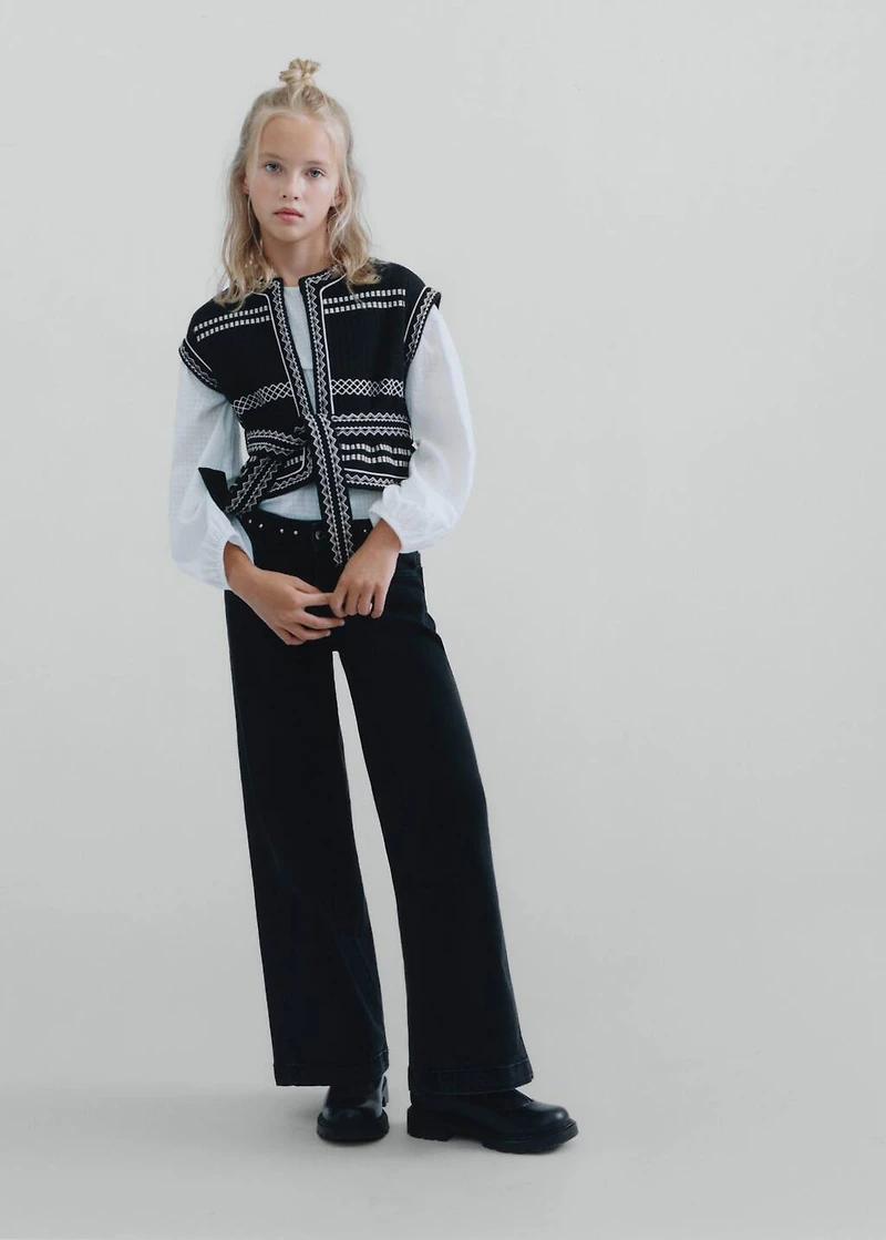 Embroidered vest with belt
