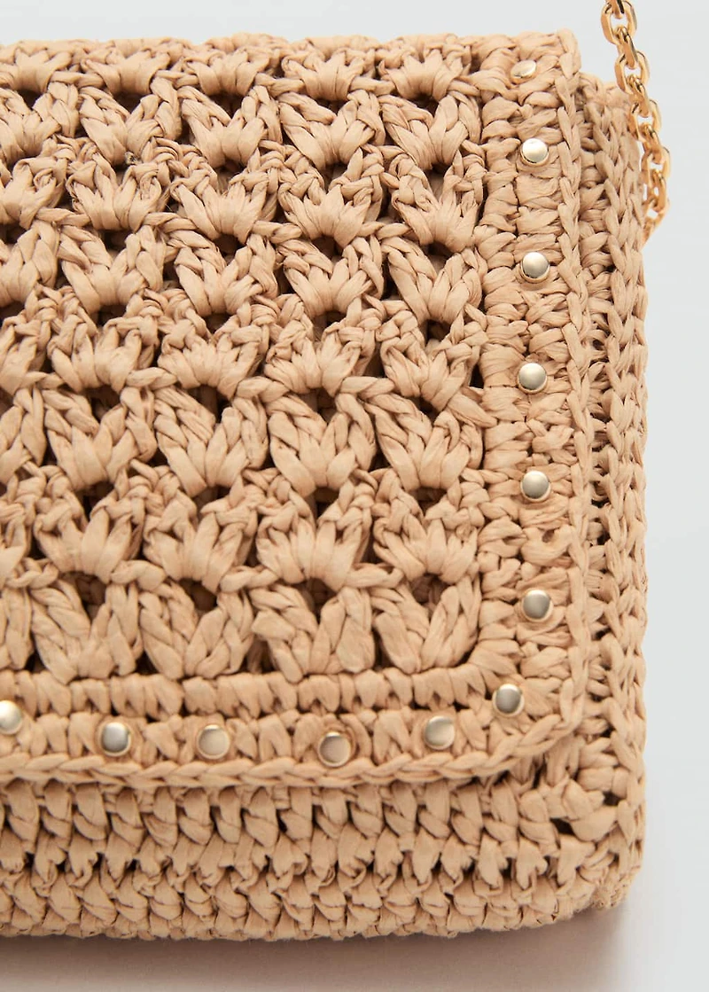 Natural fiber shoulder bag with studs