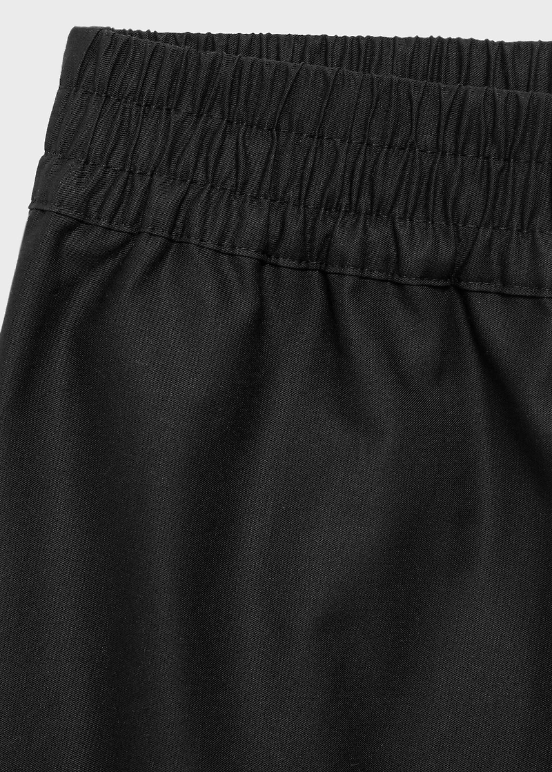 Satin shorts with embroidered hem