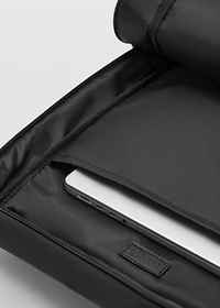 Rubberized backpack with flap closure