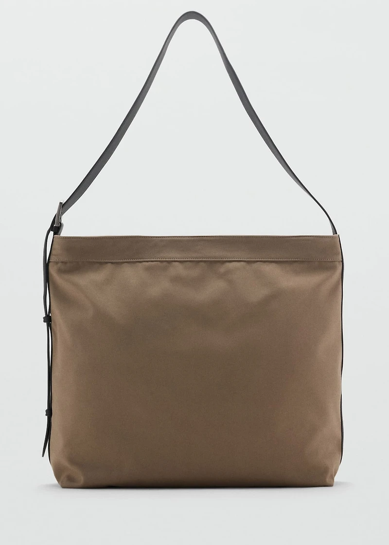 Shopper bag with adjustable handle