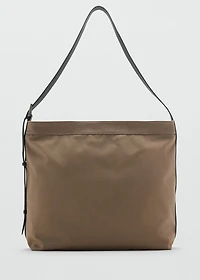 Shopper bag with adjustable handle