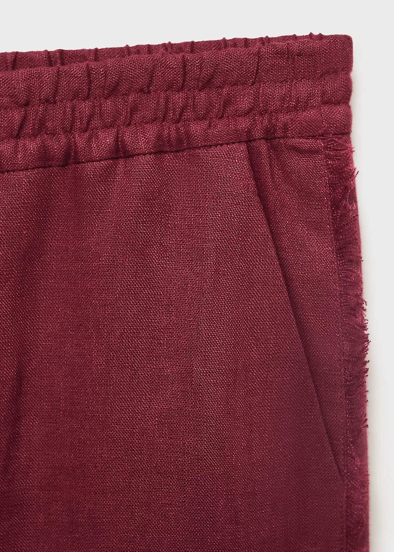 Linen suit pants with frayed ends