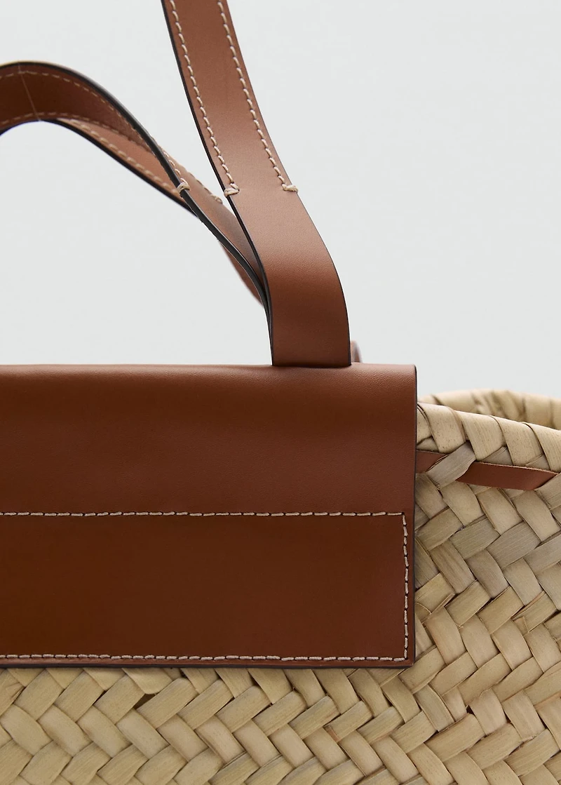 Large natural fiber basket with leather handle
