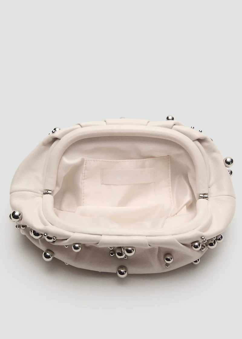 Leather handbag with ball detail