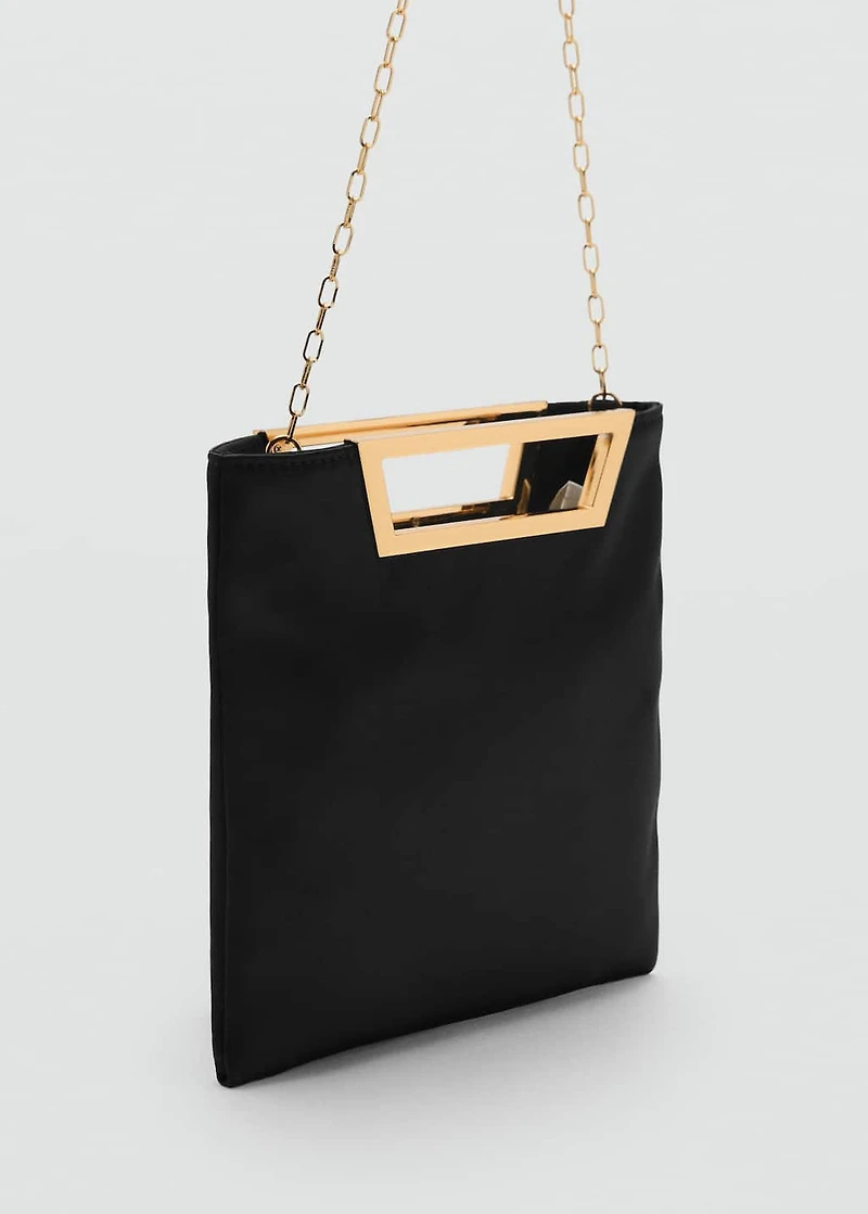 Handbag with metal handle