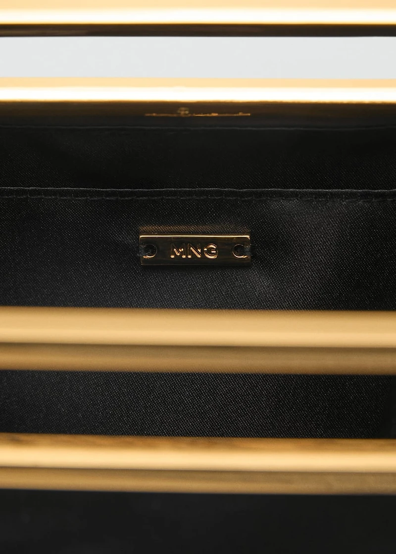 Handbag with metal handle