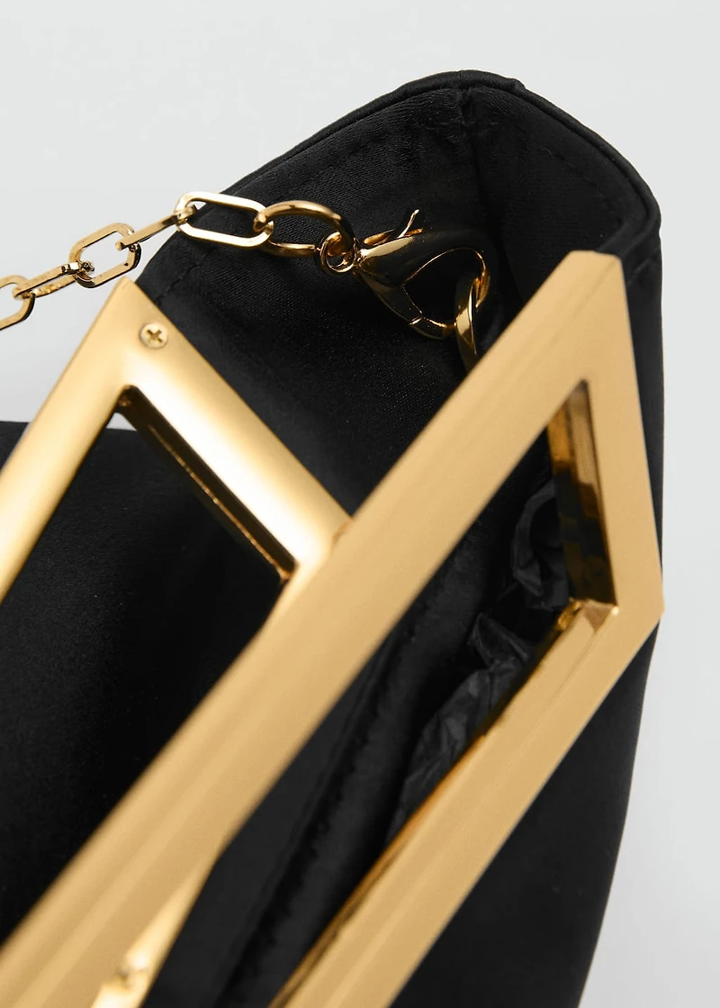 Handbag with metal handle