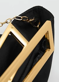Handbag with metal handle