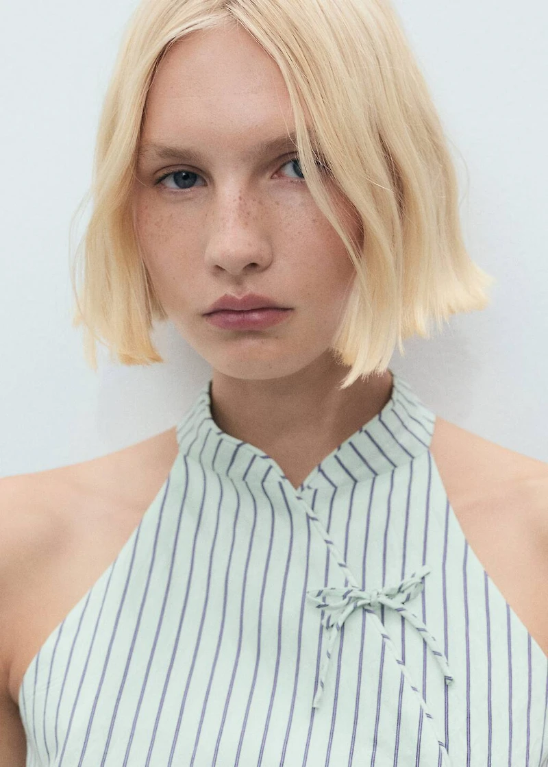 Striped top with a strap neckline and laces