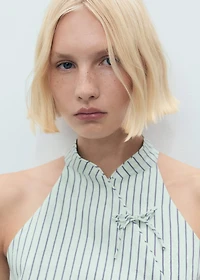 Striped top with a strap neckline and laces