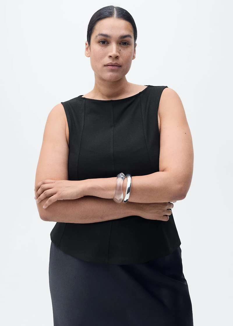 Peplum top with seam detail