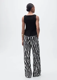 Peplum top with seam detail